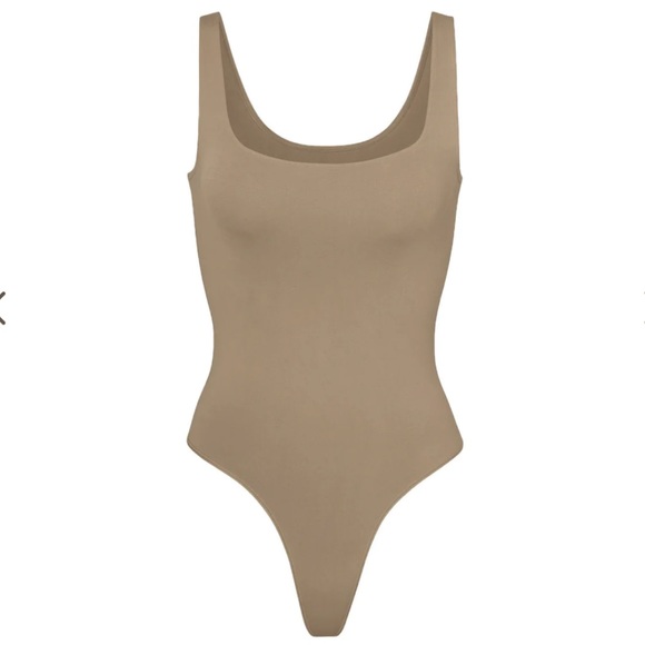 SKIMS Tops - Skims soft smoothing thong bodysuit